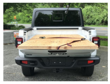 Ratchet straps tensioned over the load