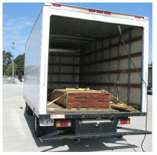 Lumber strapped down at the front and back