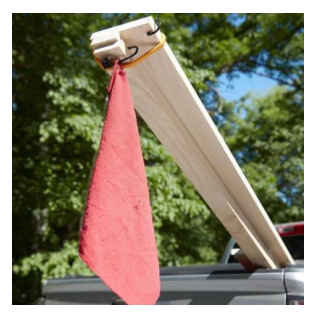 Red flag marking overhanging lumber